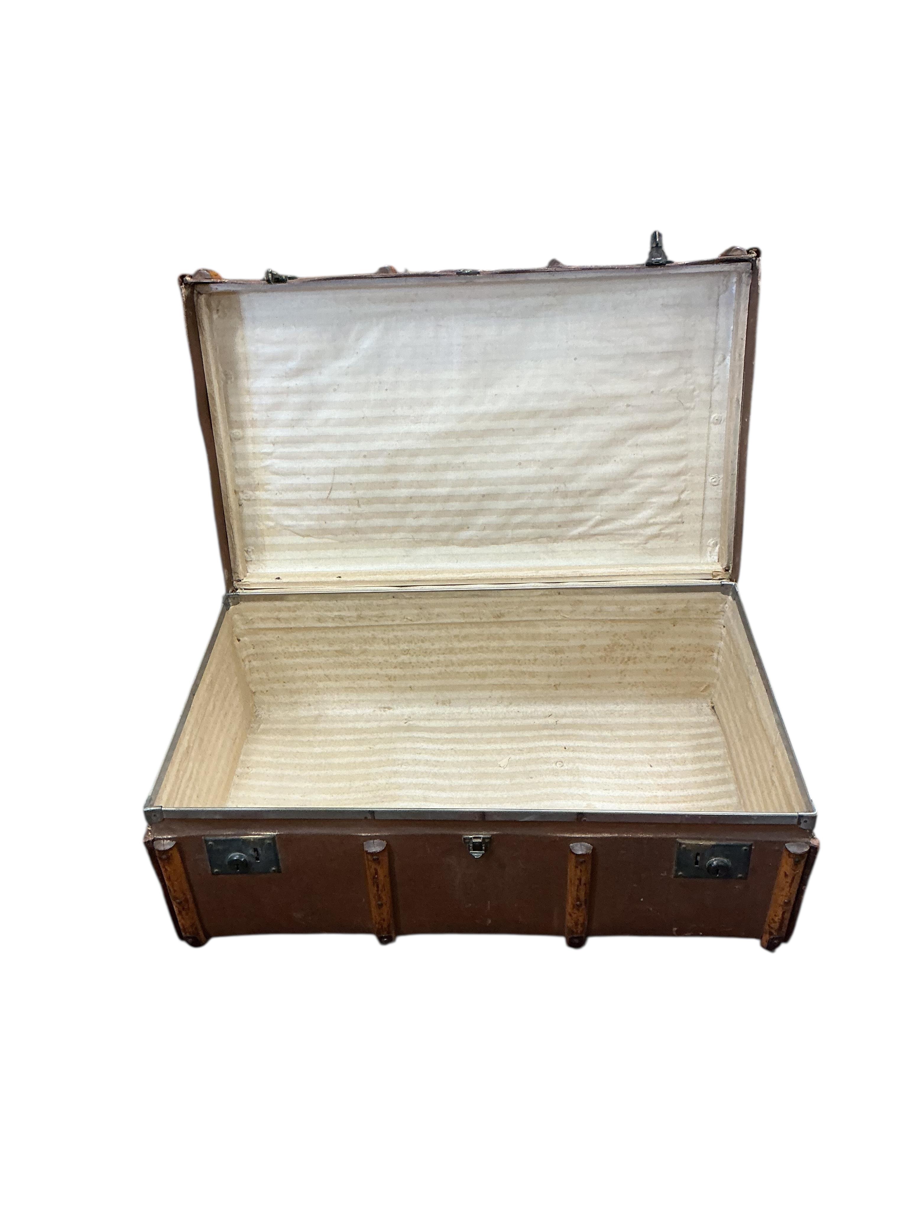 Three vintage travelling trunks, largest width 91cm, depth 51cm, height 42cm
